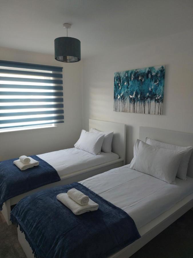 Vakantiehuis Beautiful 4-bedroom House With Private Garden & Parking